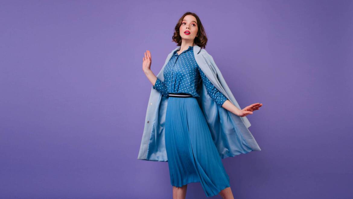 emotional-brunette-woman-blue-coat-posing-purple-wall-indoor-photo-beautiful-short-haired-female-model-trendy-midi-dress-scaled.jpg